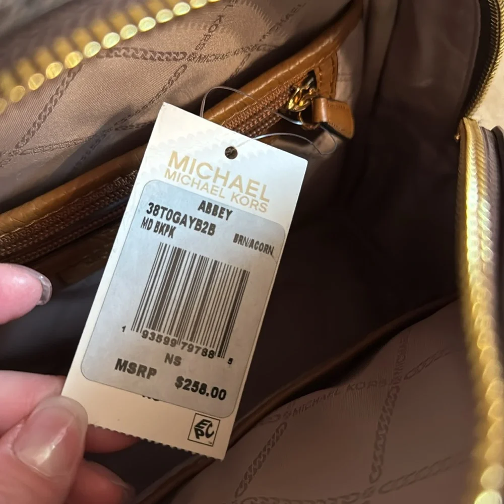Michael Kors Brown Monogrammed Backpack - Picture 12 of 13